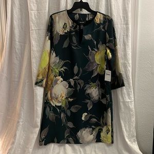 Karen Kane, multi colored on forest green background size large